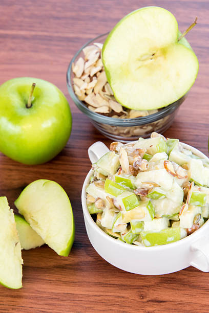 Granny Smith apple surrounded apple slices