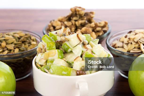 Apple Salad With Almonds Walnuts And Pumpkin Seeds Stock Photo - Download Image Now