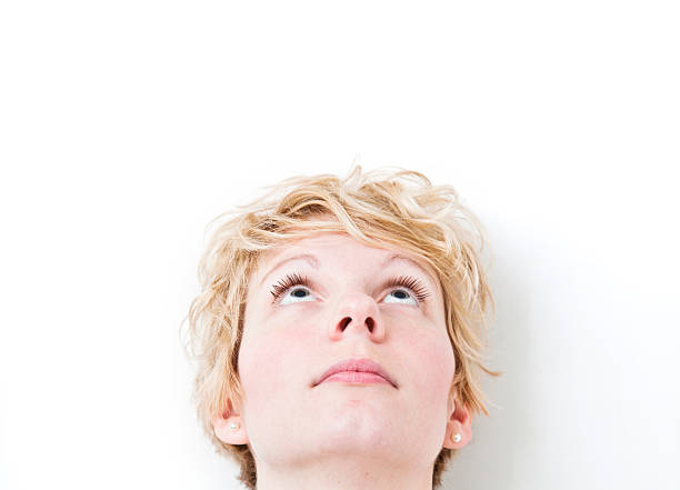 Young redhead woman headshot looking left