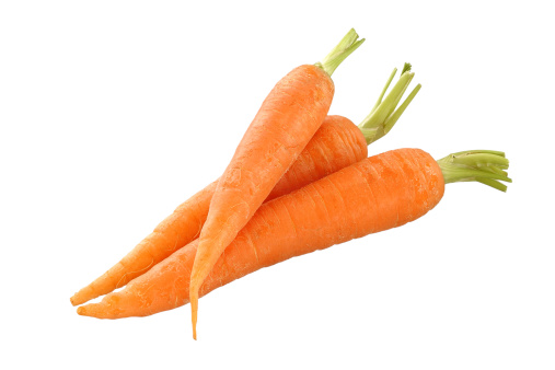 Fried carrots on wooden table