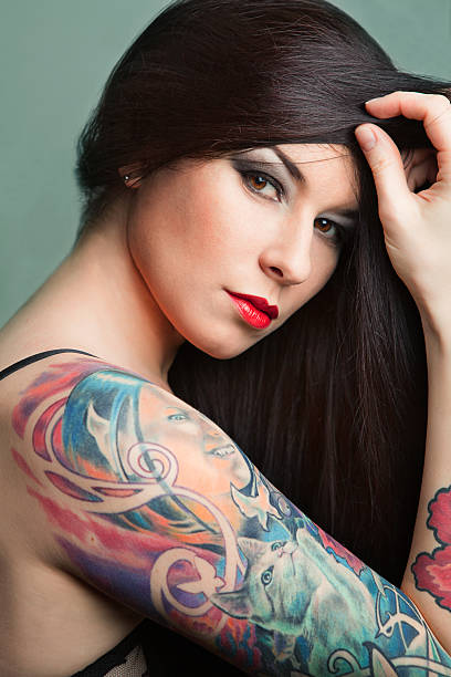 istock girl with tattoo 471359895