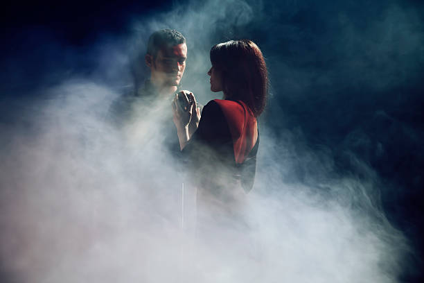 istock Duet Man and Woman with Microphone 471360173