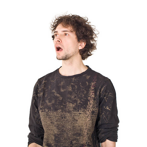 istock Surprised handsome man in black shirt. 471360636