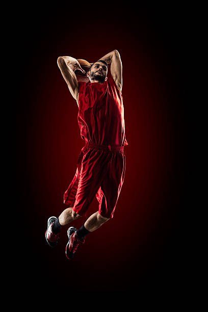 istock Basketball player in action is flying high 471360864
