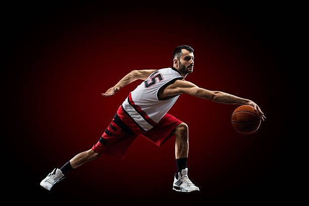 istock Basketball player in action is flying high 471360902