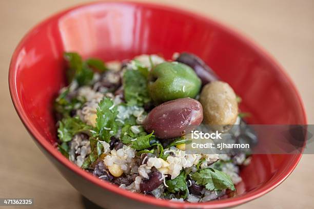 Red Asian Rice Bowl Grains And Greens Olives 1 Stock Photo - Download Image Now - Antioxidant, Asian Food, Bowl