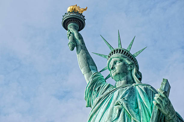 istock Statue Of Liberty in the deep blue sky 471364470