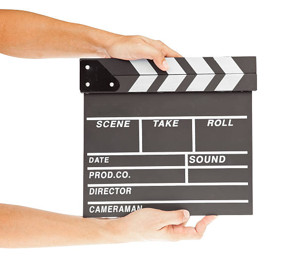 istock film clapper  board with space and hand 471365615