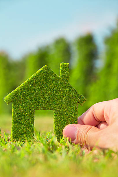 istock hand holding eco house icon 471365875