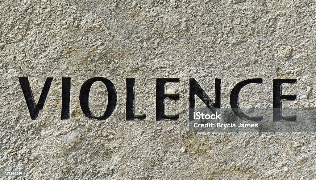 Gewalt geätzte in Stone - Lizenzfrei Einzelwort Stock-Foto