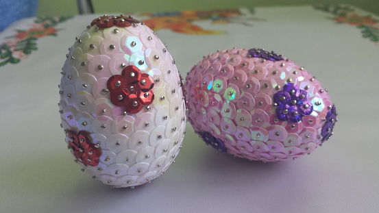 Easter eggs decorated with sequins 