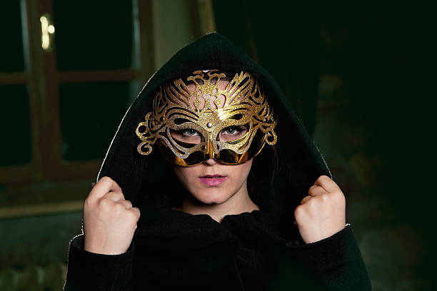 istock Beautiful lady in carnival mask 471367661