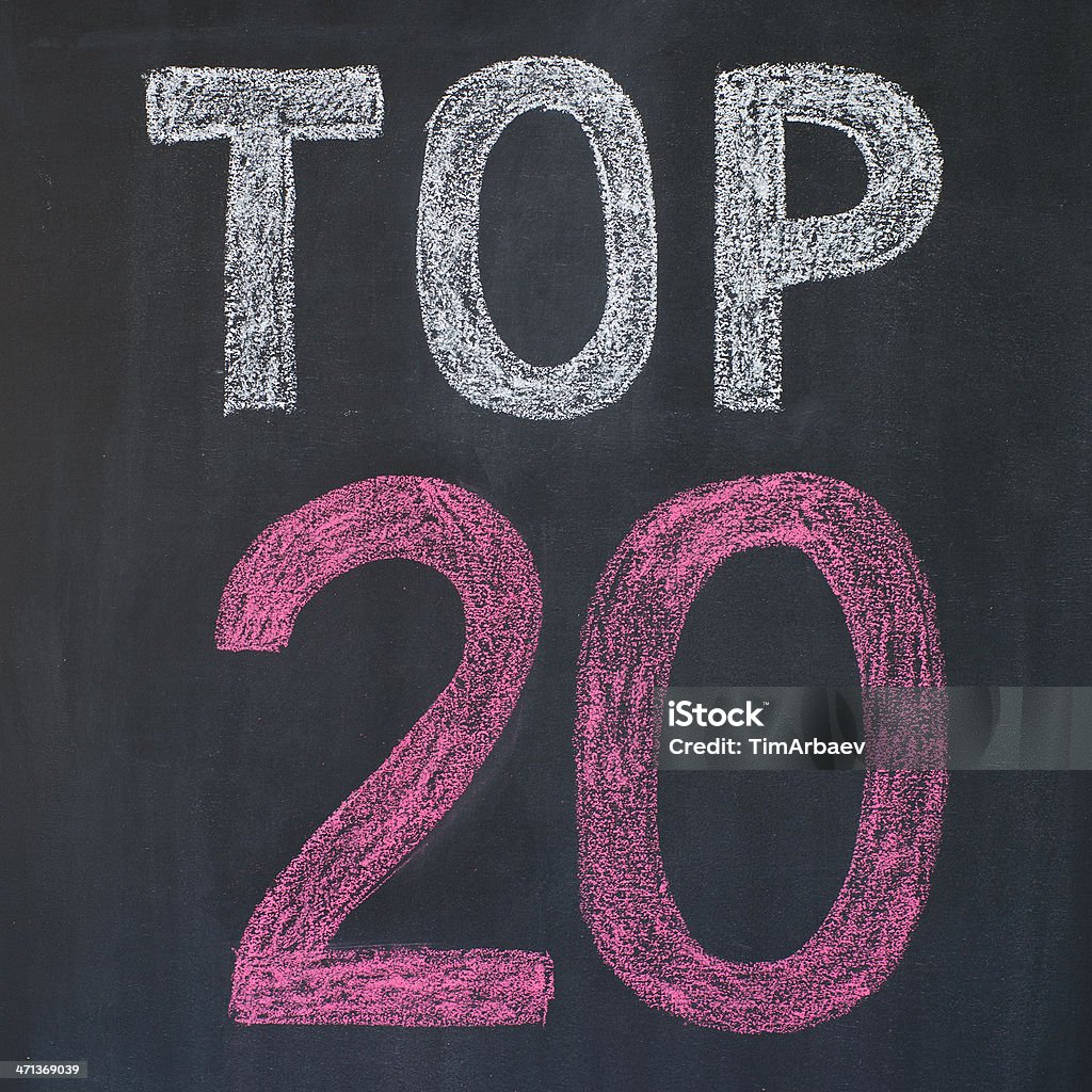 Top 20 Word "Top 20'' written by a chalk on a blackboard Achievement Stock Photo