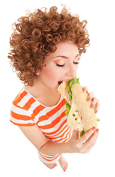 istock Fun woman with sandwich on the white background 471369337