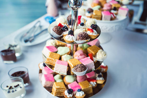 istock Beautiful multicolored decorated baked sweet candy bar cupcake on party 471369906
