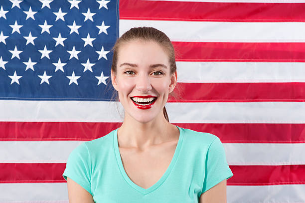 istock Woman with American flag 471370939