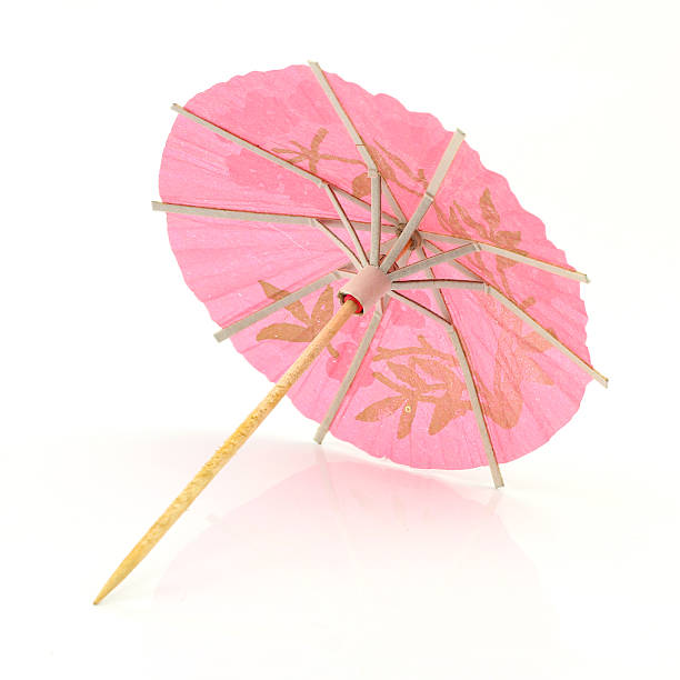 istock pink cocktail umbrella 471371039