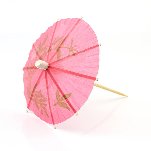 istock pink cocktail umbrella 471371089
