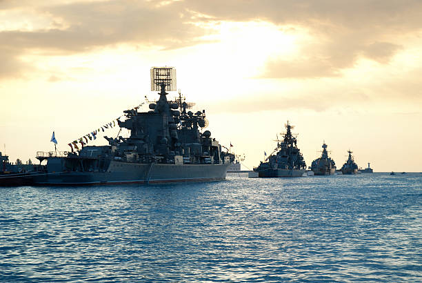 istock Row of military ships 471376597