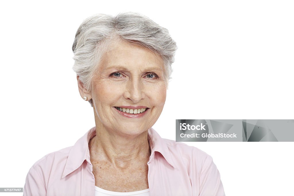 Aging gracefully with poise and positivity Beautiful senior woman smiling confidently at the camera, isolated on white - copyspace 60-69 Years Stock Photo
