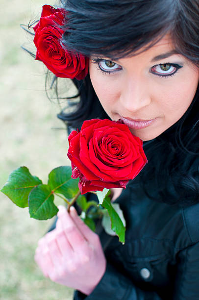 Woman with red roses file_thumbview_approve.php?size=1&id=19898242 beauty and beast rose stock pictures, royalty-free photos & images