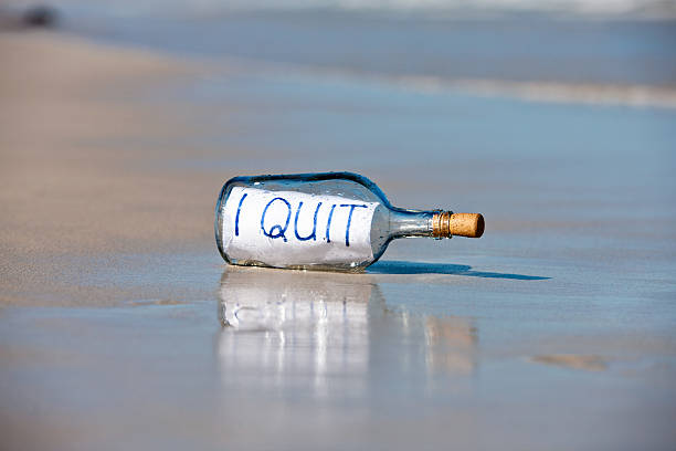 istock I quit says message in bottle washed up on beach 471377741