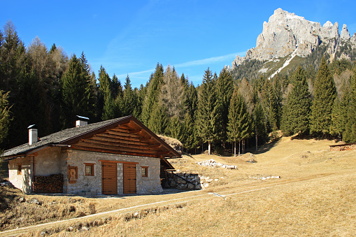 Typical mountain house in wood and stone