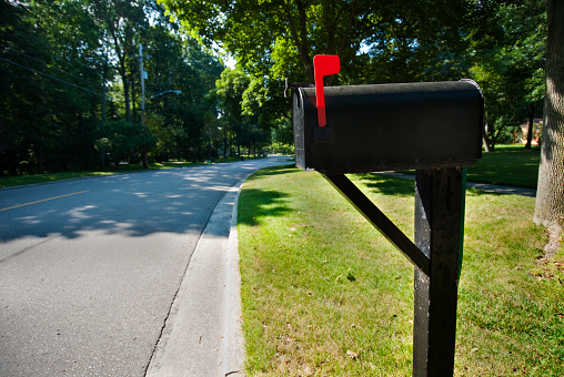 US mailbox. Focus on red flag. Converted from Nikon RAW.