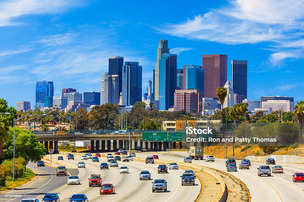 Skyline of Los Angeles with freeway traffic,CA Heavy traffic on freeway leading back to skyscrapers of Los Angele skyline. City Of Los Angeles Stock Photo
