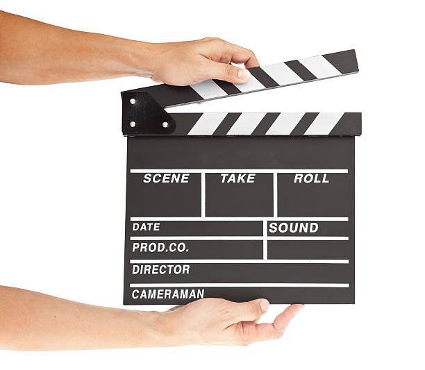 istock film clapper  board with space and hand 471379395