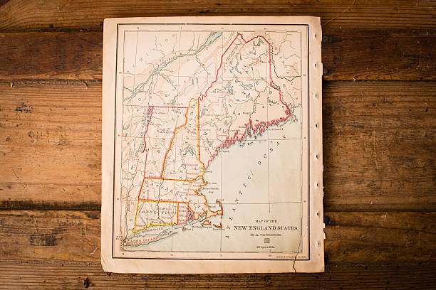 istock Old, Color Map of New England States, Sitting on Trunk 471380021