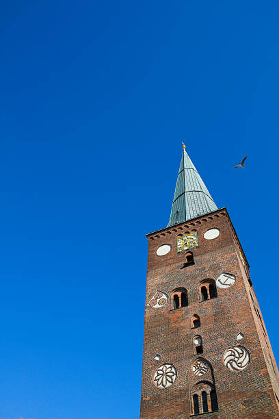 a torre da catedral de aarhus - church romanesque denmark danish culture - fotografias e filmes do acervo