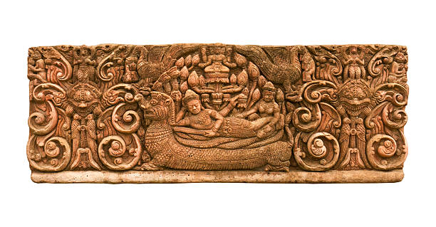 Carved sandstone king bed 1 Carved sandstone king bed on the back of Dragon the old wall.The old castle in Thailand ta som temple angkor cambodia stock pictures, royalty-free photos & images