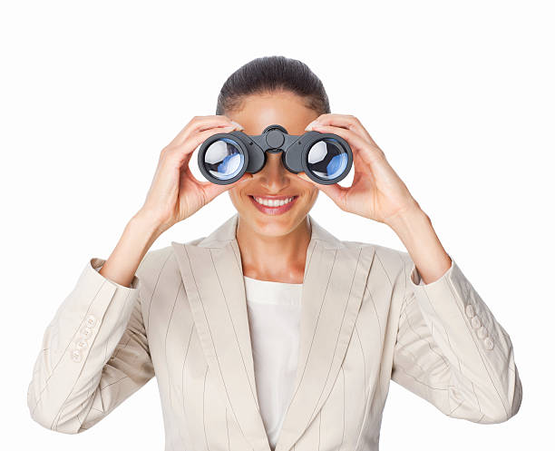 istock Businesswoman Looking Through Binoculars - Isolated 471380869