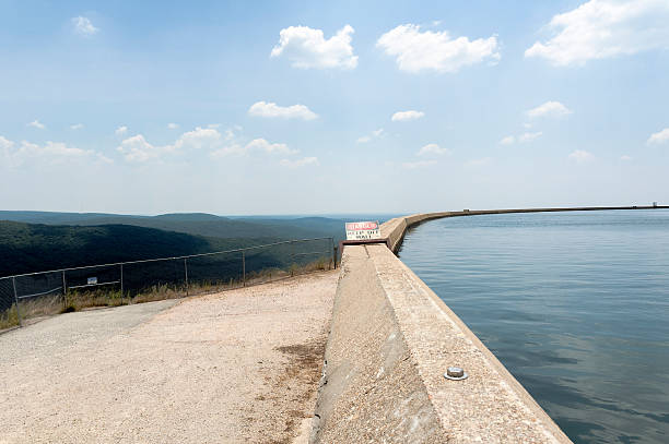 The upper reservoir of the Taum Sauk pump-storage power plant.  This photograph was taken five months before the retaining wall shown collapsed flooding the valley below with 1.5 billion gallons of water.