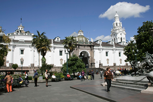 Quito, Ecuador - June 10, 2009: People often gather in front of the Quito Cathedral in Independence Square.