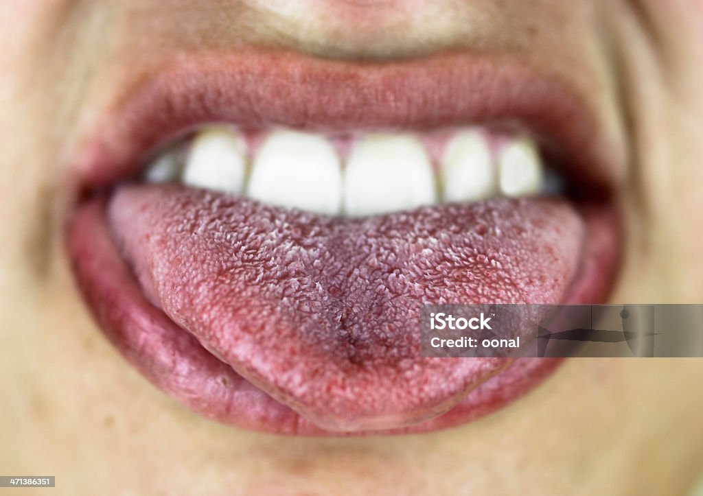 Mouth with wide open tongue Sticking Out Tongue Stock Photo