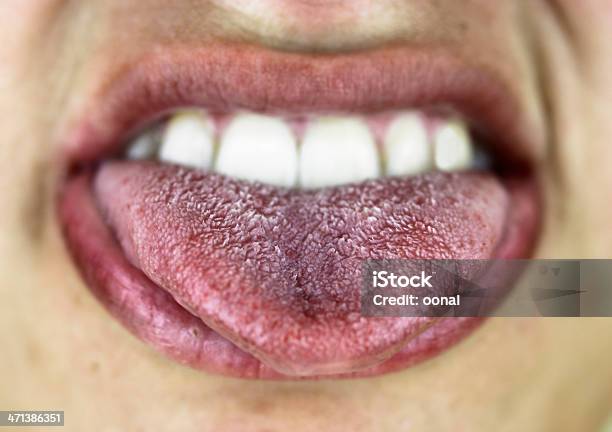 Mouth With Wide Open Tongue Stock Photo - Download Image Now - Sticking Out Tongue, Adult, Anatomy