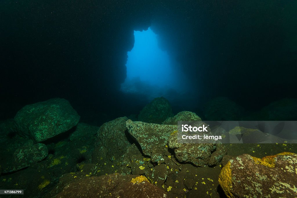 entrance entrance of an underwatercave in madeira. Blue Stock Photo