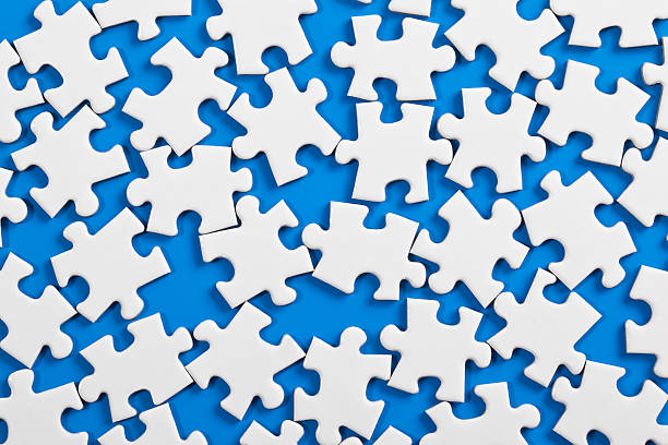 dispersa'puzzle' - teamwork absence blank jigsaw puzzle imagens e fotografias de stock