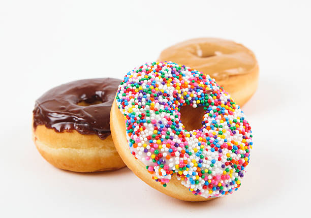 Three donuts on a white background stock photo