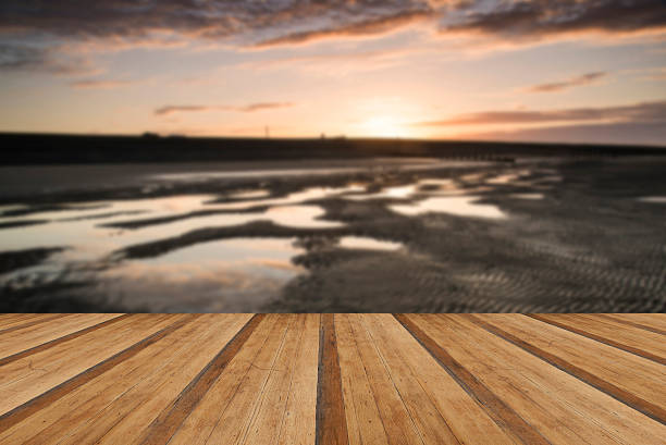 istock Vibrant sunrise landscape reflected in low tide water 471387424