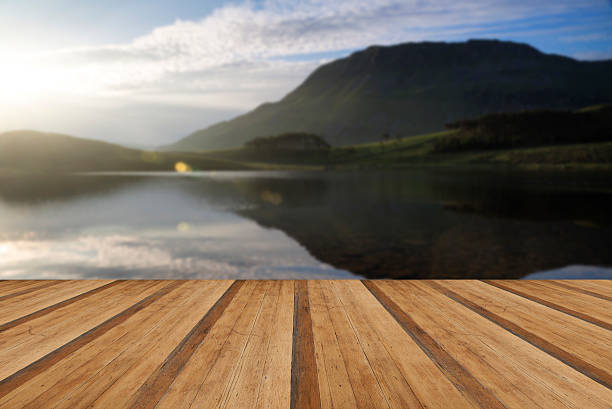istock Stunning mountain and lake sunrise reflections beautiful landsca 471387432
