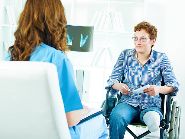 istock Disabled Woman At Doctors Office. 471387509