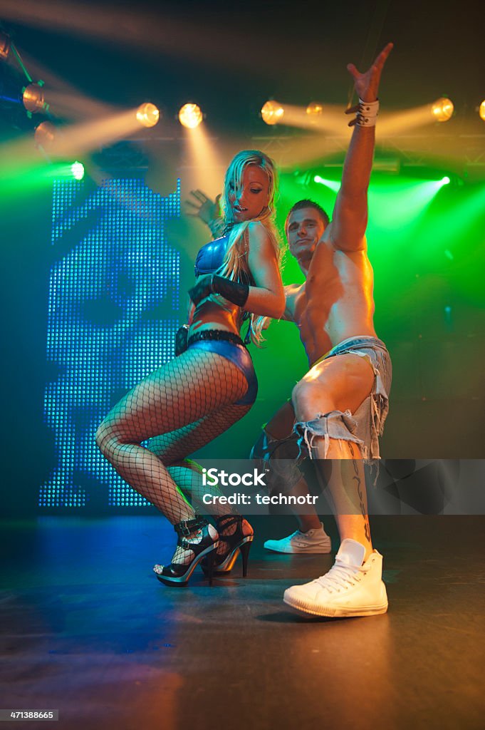 Portrait of two young dance performers on stage Front view of nice heterosexual couple as dance performers on the stage 20-24 Years Stock Photo