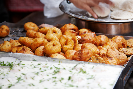 Indian street vendor deep-fried snack
