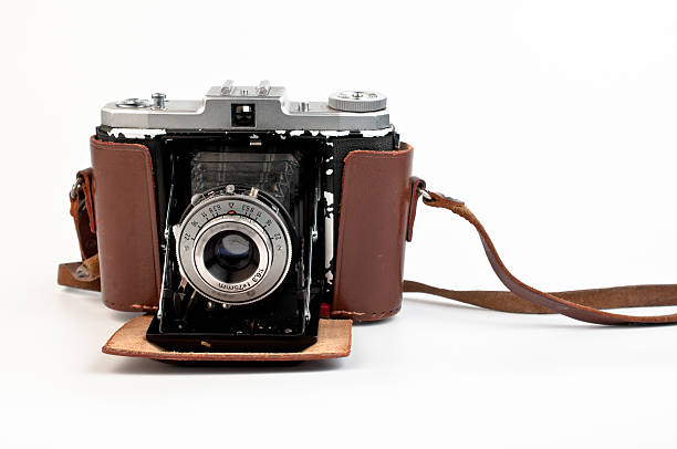 istock old camera lens bellows leather case analog white background 471389357