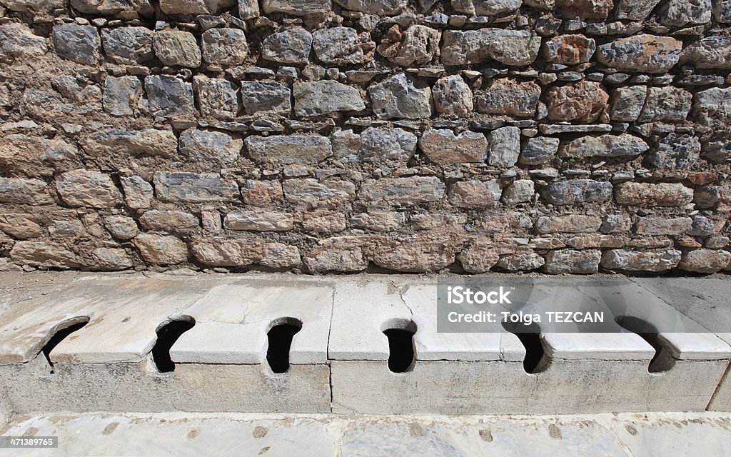 Ephesus toilet The latrina (public toilet), in the ancient city of Ephesus. Toilet Stock Photo