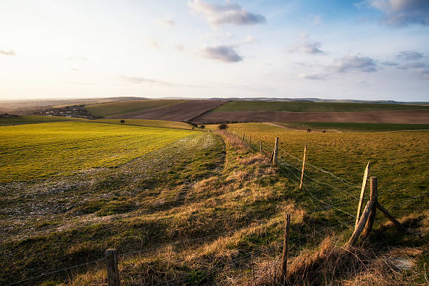 istock Beautiful Spring evening sunset light over fields landscape on f 471390710