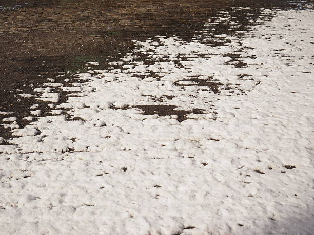 istock Cobblestone roadway with snow 471391224
